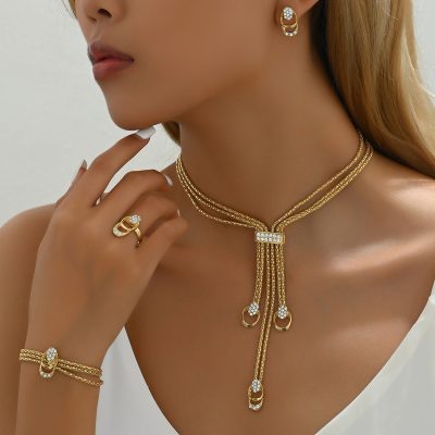 Gold color diamond-studded necklace suit